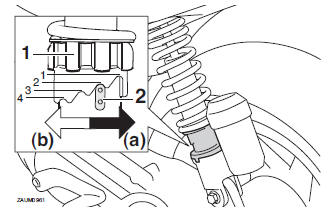 Adjusting the shock absorber assembly (if equipped)