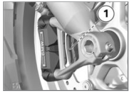 Checking front brake pad thickness